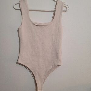 Elegant Cream Women's Bodysuit